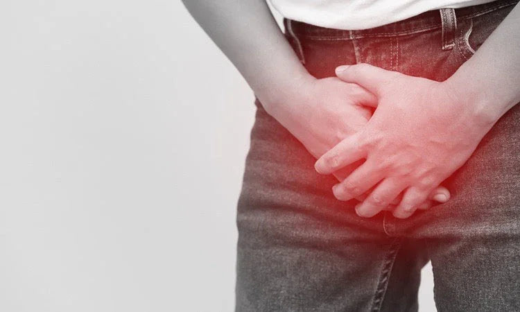 Person clutching lower abdomen in pain, urinary discomfort or pelvic health concern