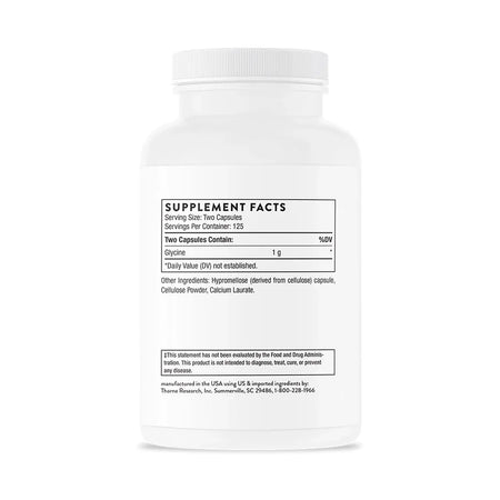 White supplement bottle with detailed supplement facts label showing glycine capsules ingredients.